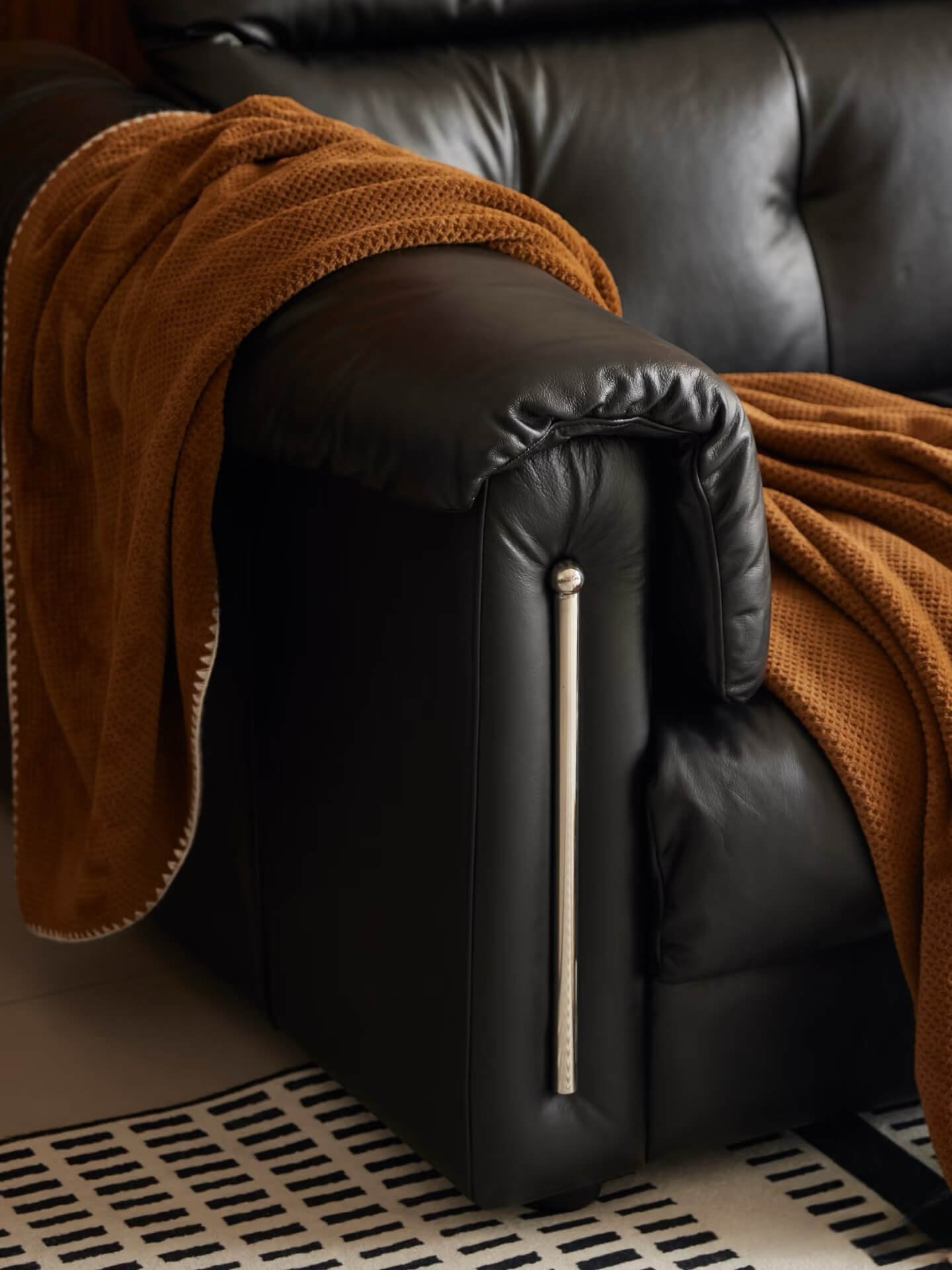 Elevate Your Living Room with This Customizable Black Leather Sofa